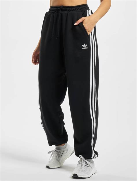 adidas jogginghose außen schwarz innen oranges netz|adidas originals jogginghose damen.